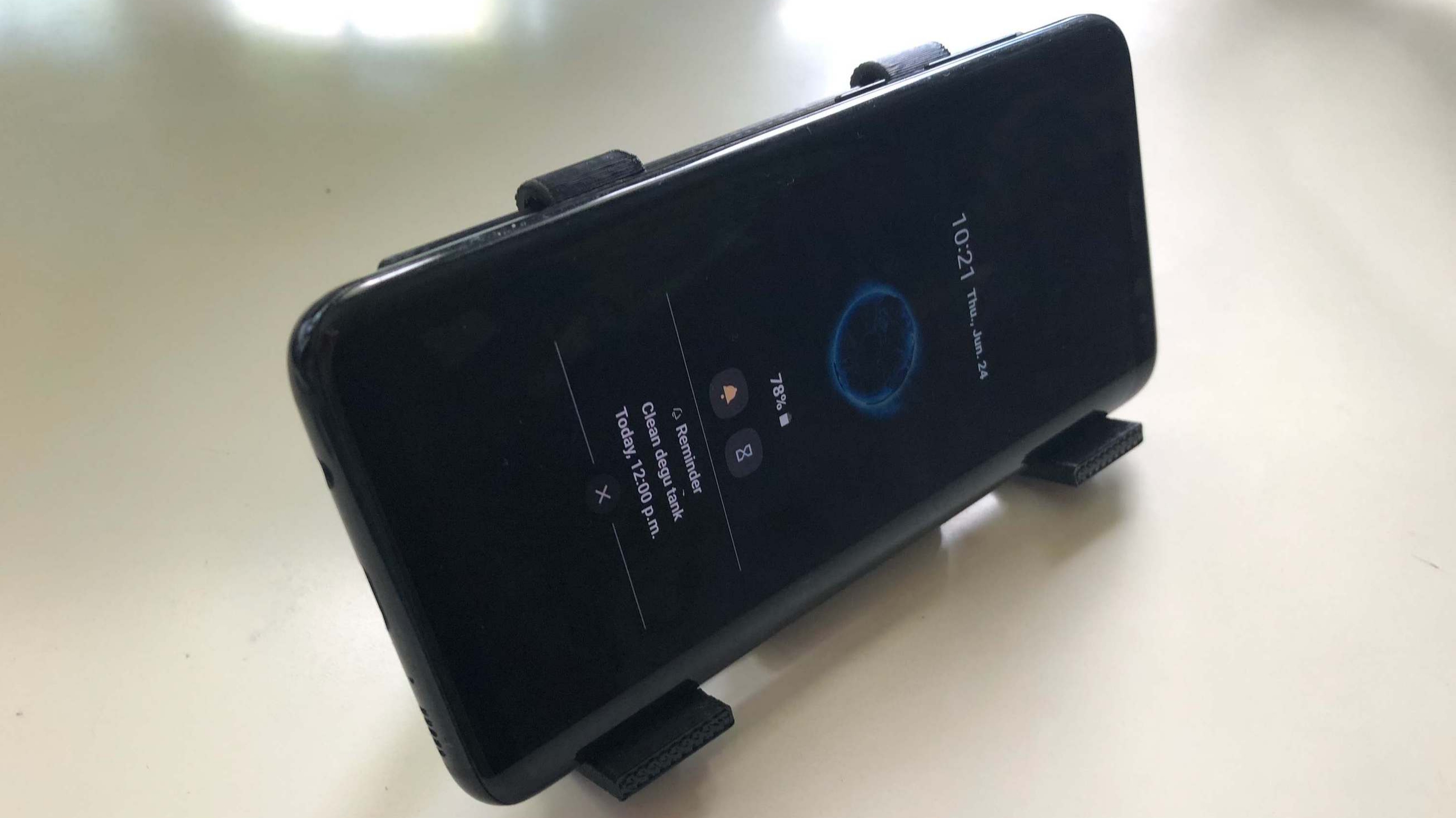 Printed design holding a large phone